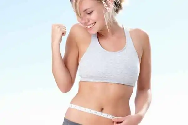 woman happy after fat reduction treatment Durham