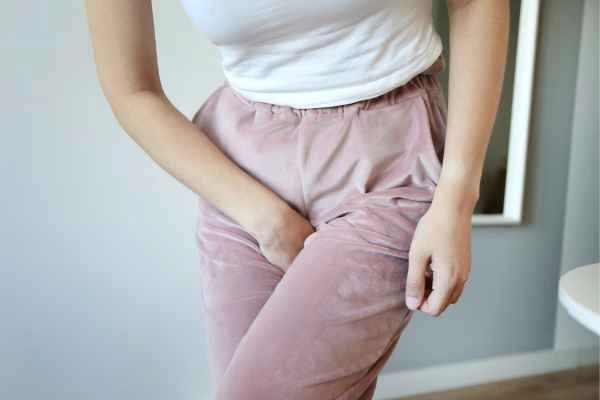 woman struggling with urine incontinence Durham